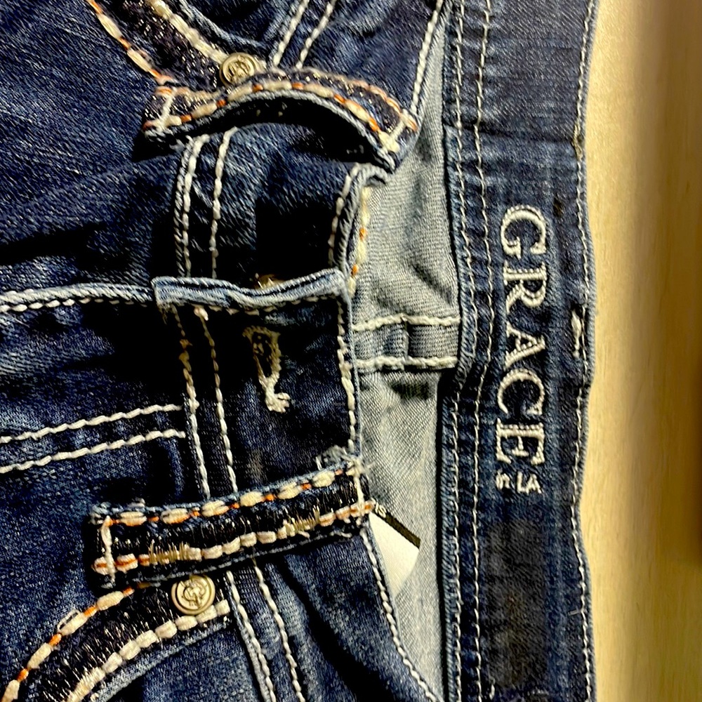 Grace in La Size 26 Straight leg jean.